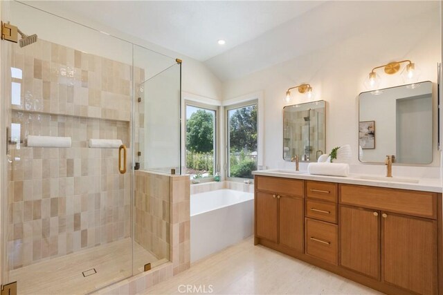 21679 Calle Alcazar, Yorba Linda, CA 92887 - full bathroom featuring lofted ceiling, double vanity, a garden tub, and a stall shower