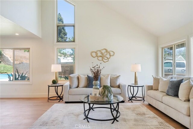 21679 Calle Alcazar, Yorba Linda, CA 92887 - living area featuring high vaulted ceiling and wood finished floors