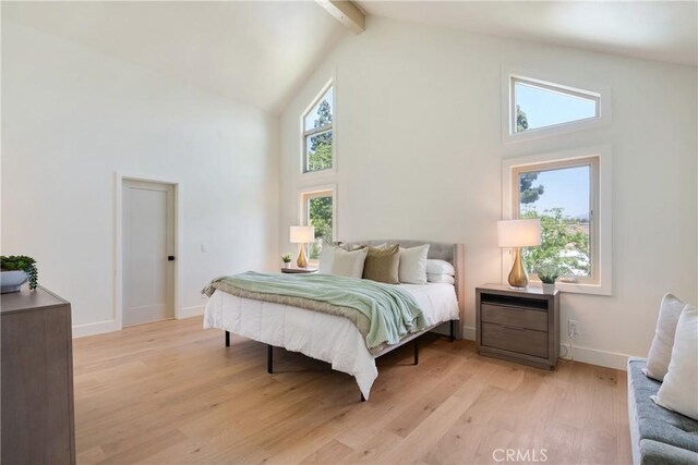 21679 Calle Alcazar, Yorba Linda, CA 92887 - bedroom with high vaulted ceiling, beamed ceiling, and light wood-style floors
