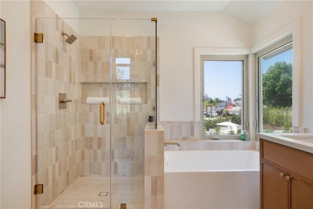 21679 Calle Alcazar, Yorba Linda, CA 92887 - bathroom with a garden tub, vanity, a stall shower, and lofted ceiling