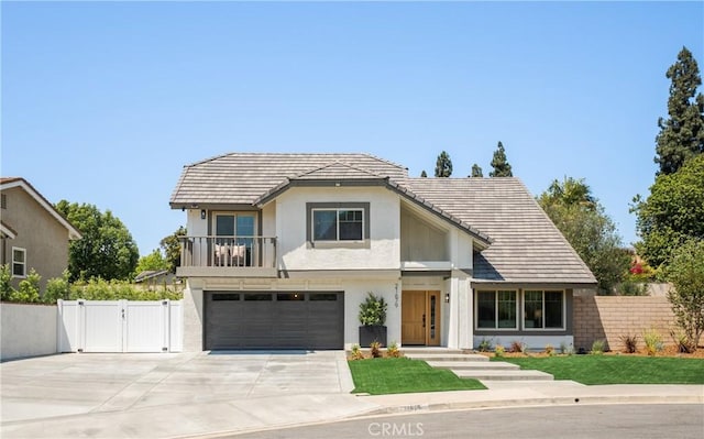 21679 Calle Alcazar, Yorba Linda, CA 92887 - view of front of house featuring driveway, a gate, an attached garage, and stucco siding