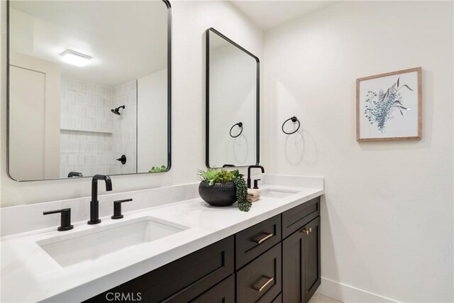 21679 Calle Alcazar, Yorba Linda, CA 92887 - full bathroom featuring double vanity and a tile shower