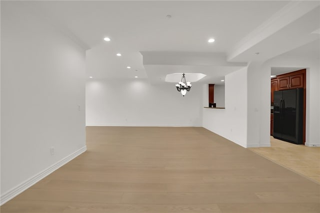 8555 Cashio St Unit 203, Los Angeles, CA 90035 - spare room featuring a chandelier, recessed lighting, and light wood-style floors