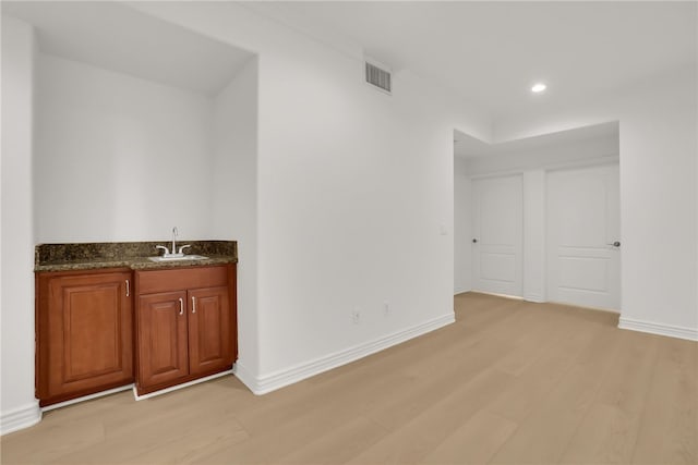 8555 Cashio St Unit 203, Los Angeles, CA 90035 - indoor wet bar with light wood-type flooring and recessed lighting