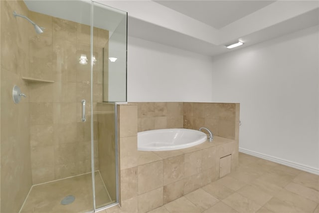 8555 Cashio St Unit 203, Los Angeles, CA 90035 - bathroom with a garden tub, a shower stall, and tile patterned floors