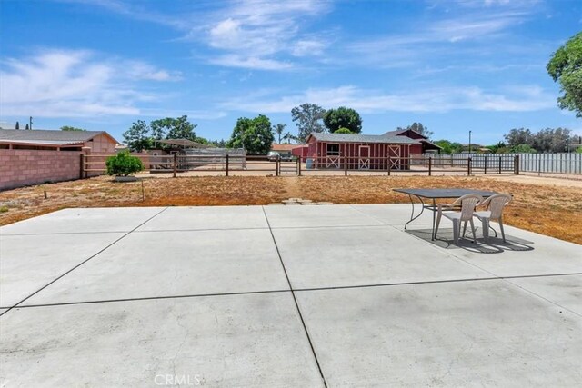 1500 Pacific Ave, Norco, CA 92860 - fenced backyard featuring a patio and an outbuilding