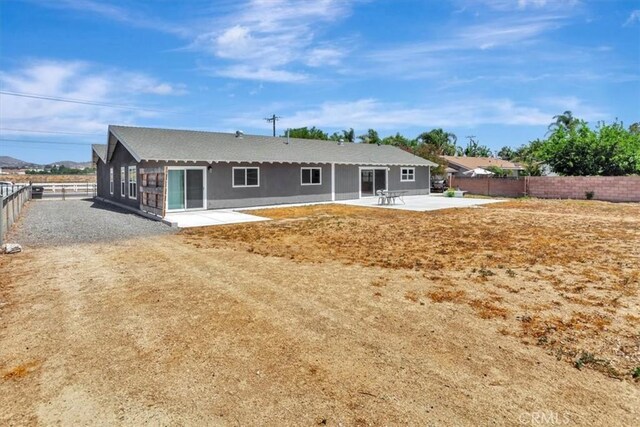 1500 Pacific Ave, Norco, CA 92860 - back of property with a patio and a fenced backyard