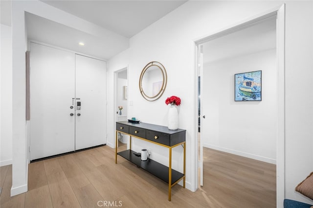 1520 Camden Ave Unit 101, Los Angeles, CA 90025 - entrance foyer featuring light wood-style floors and recessed lighting