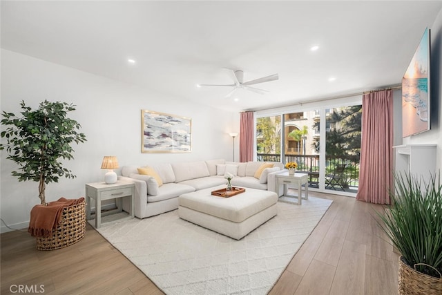 1520 Camden Ave Unit 101, Los Angeles, CA 90025 - living area featuring a ceiling fan, wood finished floors, and recessed lighting