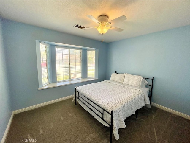 3332 Shamrock Pl, Merced, CA 95340 - bedroom featuring carpet flooring, a ceiling fan, and a textured ceiling