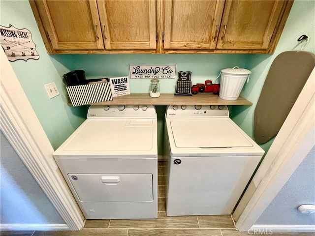 3332 Shamrock Pl, Merced, CA 95340 - laundry area featuring washing machine and clothes dryer and cabinet space