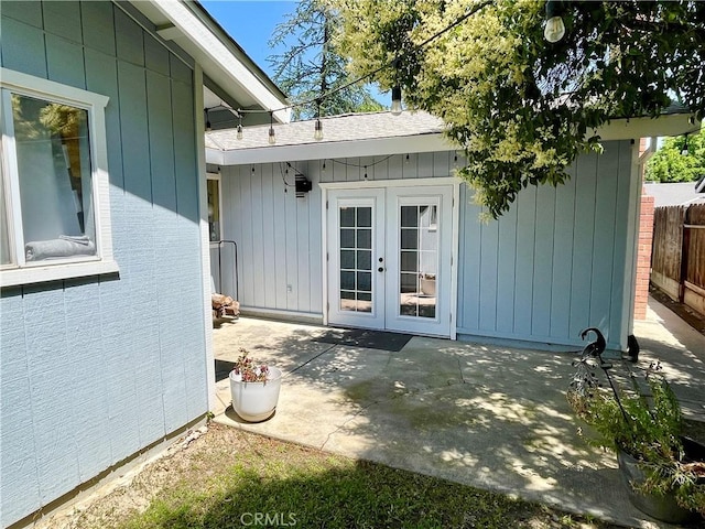 3332 Shamrock Pl, Merced, CA 95340 - entrance to property featuring french doors, a patio, and roof with shingles