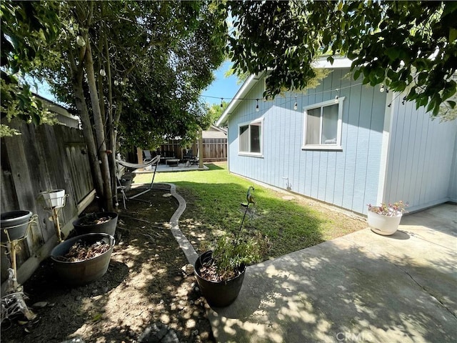 3332 Shamrock Pl, Merced, CA 95340 - fenced backyard featuring a patio area
