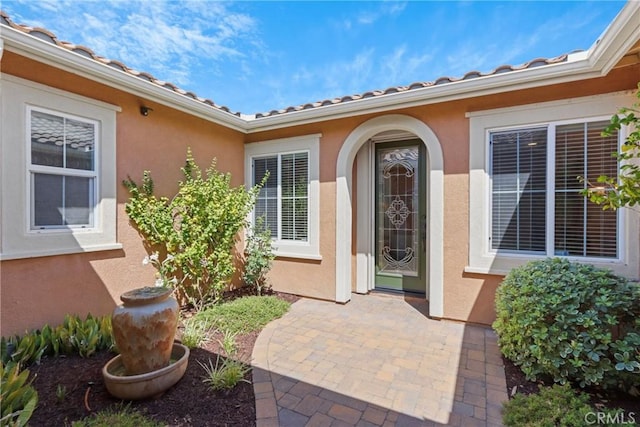 44655 Howell Mountain St, Temecula, CA 92592 - doorway to property with a patio and stucco siding