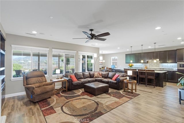 44655 Howell Mountain St, Temecula, CA 92592 - living room featuring light wood finished floors, a ceiling fan, and recessed lighting