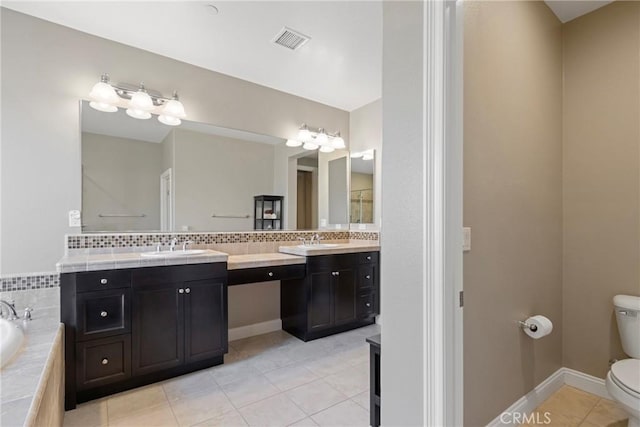 44655 Howell Mountain St, Temecula, CA 92592 - full bathroom featuring double vanity, tile patterned flooring, a garden tub, and decorative backsplash