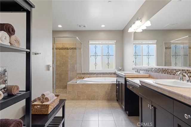44655 Howell Mountain St, Temecula, CA 92592 - full bathroom featuring tile patterned floors, a shower stall, vanity, a garden tub, and recessed lighting