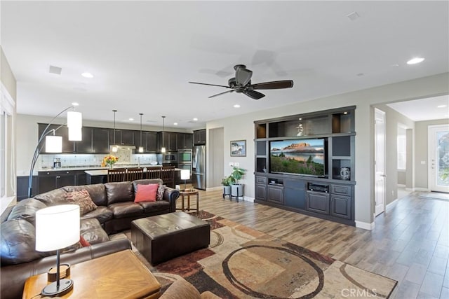 44655 Howell Mountain St, Temecula, CA 92592 - living area with light wood-style floors, ceiling fan, and recessed lighting