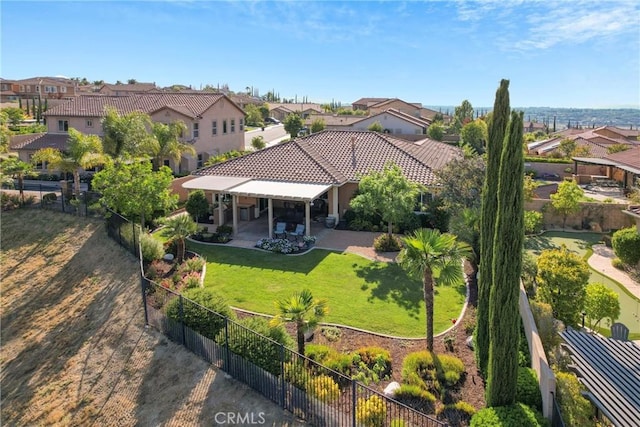44655 Howell Mountain St, Temecula, CA 92592 - back of house featuring a residential view, a patio, a fenced backyard, and a tiled roof