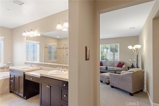 44655 Howell Mountain St, Temecula, CA 92592 - full bathroom with a shower stall, double vanity, a garden tub, ensuite bathroom, and tasteful backsplash