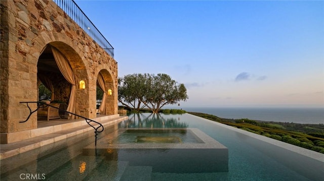 36 Pelican Crest Dr, Newport Coast, CA 92657 - view of swimming pool featuring a water view and a pool with connected hot tub