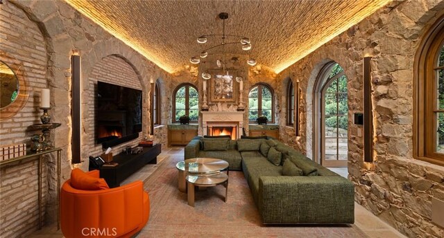 36 Pelican Crest Dr, Newport Coast, CA 92657 - living area with a warm lit fireplace
