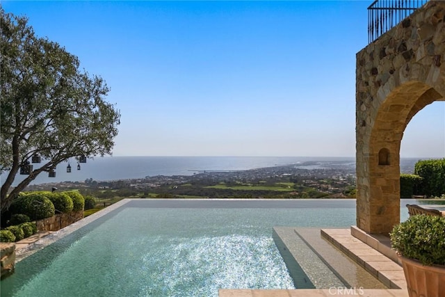 36 Pelican Crest Dr, Newport Coast, CA 92657 - view of swimming pool featuring a water view