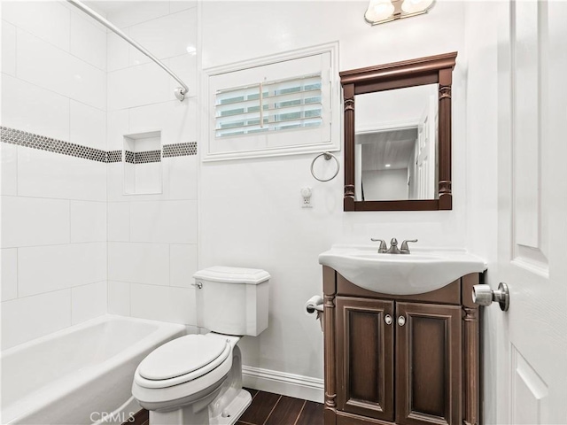 2128 E 3rd St, Los Angeles, CA 90033 - bathroom with vanity, shower / washtub combination, and wood finished floors