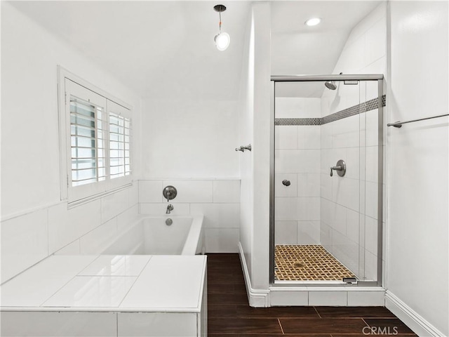 2128 E 3rd St, Los Angeles, CA 90033 - bathroom featuring a stall shower, a garden tub, wood finished floors, and recessed lighting