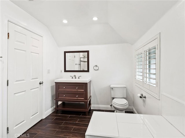 2128 E 3rd St, Los Angeles, CA 90033 - bathroom with vanity, vaulted ceiling, wood tiled floors, and recessed lighting