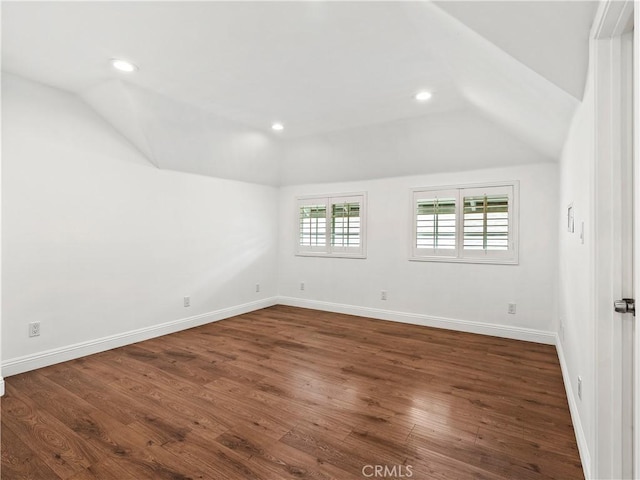 2128 E 3rd St, Los Angeles, CA 90033 - empty room with vaulted ceiling, dark wood-type flooring, and recessed lighting