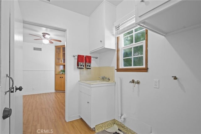 3857 W 135th, Hawthorne, CA 90250 - laundry room with light wood finished floors and a ceiling fan
