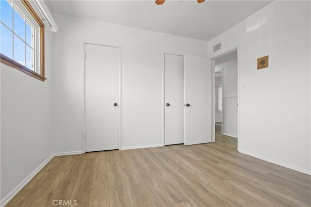 3857 W 135th, Hawthorne, CA 90250 - unfurnished bedroom featuring light wood finished floors and ceiling fan