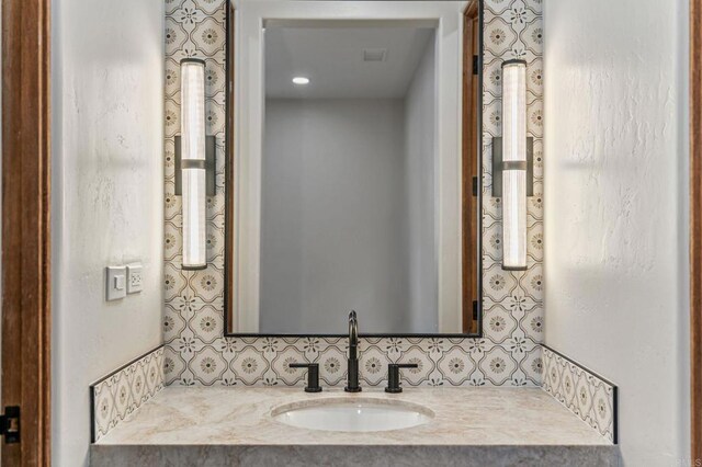 6937 Corte Spagna, Rancho Santa Fe, CA 92091 - bathroom with decorative backsplash and vanity