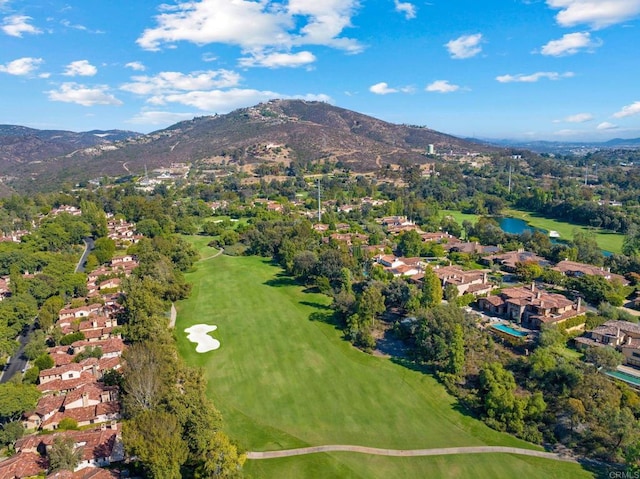 6937 Corte Spagna, Rancho Santa Fe, CA 92091 - aerial view of property's location featuring a mountain backdrop and nearby suburban area