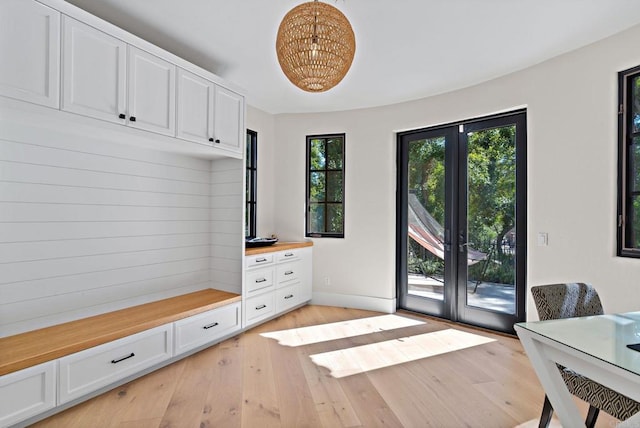 6937 Corte Spagna, Rancho Santa Fe, CA 92091 - mudroom featuring french doors, light wood-style floors, and a chandelier