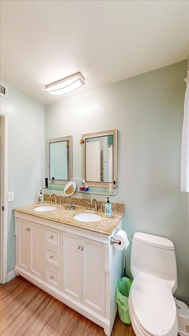 1110 Benjamin Pl, El Cajon, CA 92020 - full bathroom featuring wood finished floors and double vanity