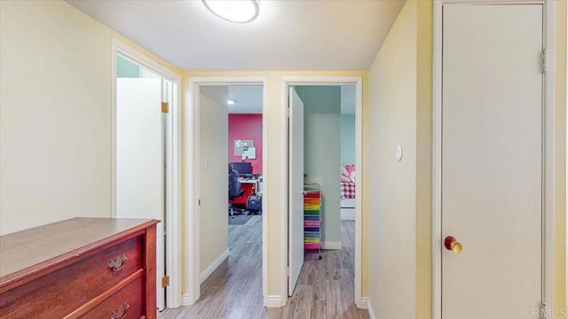 1110 Benjamin Pl, El Cajon, CA 92020 - hall featuring light wood finished floors and baseboards