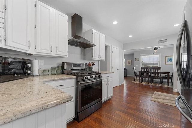 1200 S Pennsylvania Ave, Glendora, CA 91740 - kitchen with stainless steel appliances, wall chimney range hood, white cabinetry, recessed lighting, and dark wood finished floors
