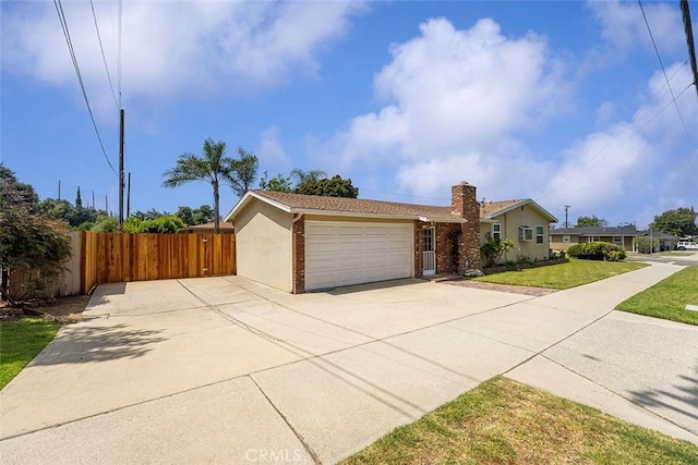 1200 S Pennsylvania Ave, Glendora, CA 91740 - ranch-style house featuring an attached garage, a chimney, concrete driveway, and stucco siding