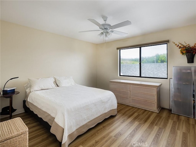 715 W Palm Ave, El Segundo, CA 90245 - bedroom with light wood-type flooring and a ceiling fan
