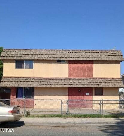 335 Pearson Dr, Porterville, CA 93257 - view of property with a fenced front yard