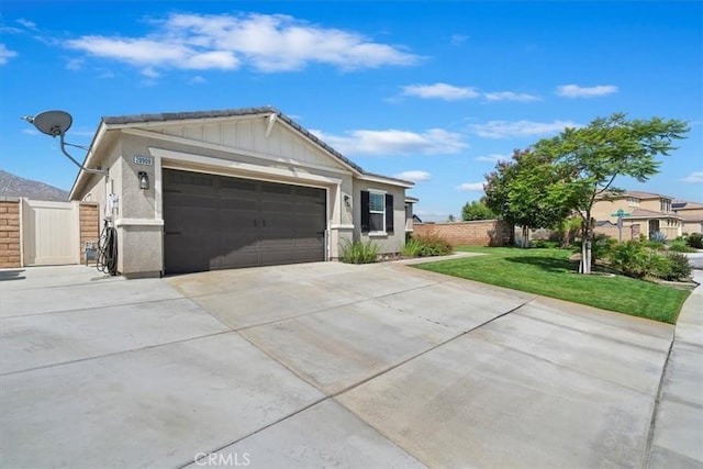 20909 Spring St, Riverside, CA 92507 - single story home featuring driveway, a garage, stucco siding, and board and batten siding