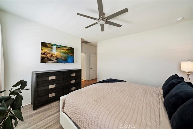 20909 Spring St, Riverside, CA 92507 - bedroom with light wood-style floors and a ceiling fan