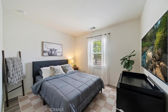 20909 Spring St, Riverside, CA 92507 - bedroom with light wood-style flooring and baseboards