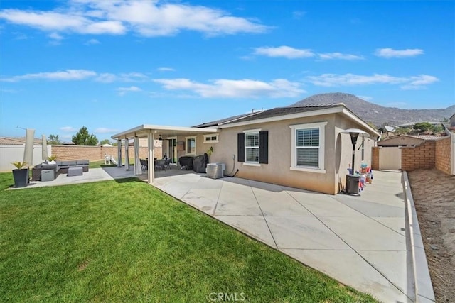 20909 Spring St, Riverside, CA 92507 - rear view of property with outdoor lounge area, a fenced backyard, a patio area, and stucco siding