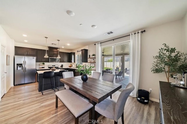20909 Spring St, Riverside, CA 92507 - dining room featuring light wood-type flooring and recessed lighting
