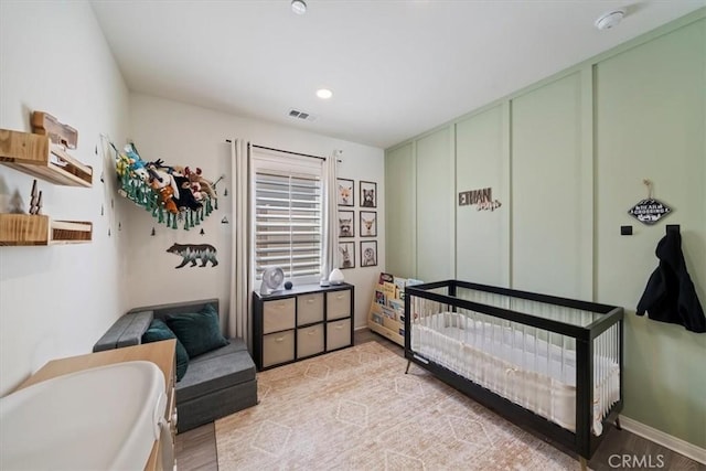 20909 Spring St, Riverside, CA 92507 - bedroom with light wood-style flooring