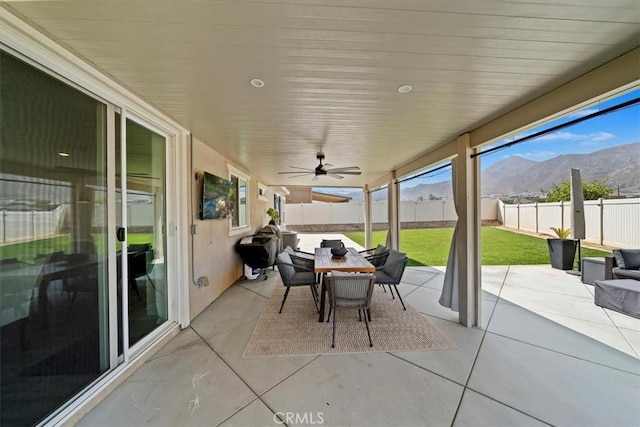 20909 Spring St, Riverside, CA 92507 - fenced backyard featuring outdoor dining area, a patio area, and ceiling fan