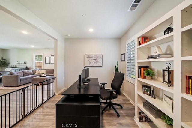 20909 Spring St, Riverside, CA 92507 - office area with wood finished floors, recessed lighting, and built in shelves